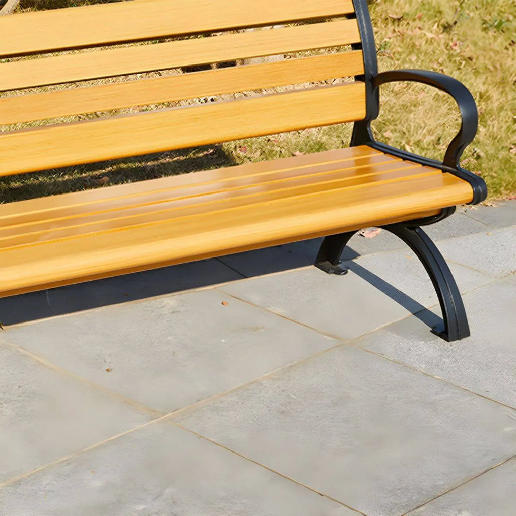 Industrial Cast Iron Bench with Solid Wood Slats and Curved Armrests