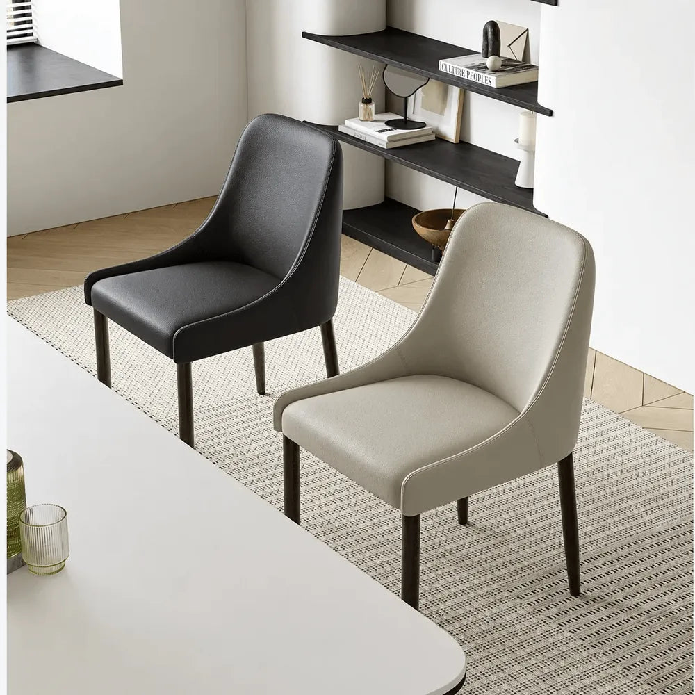 Italian Minimalist Dining Chair Series with Curved Arms, Leather Upholstery and Slim Steel Legs