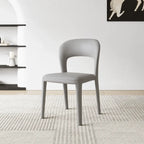 Italian Minimalist Dining Chair Series with Cutout Back and Leather Upholstery Main Product Image