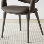 Italian Minimalist Dining Chair with Wraparound Arms and Slim Steel Legs