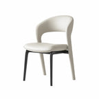 Italian Sculptural Dining Chair Series with Wraparound Arms and Leather Upholstery