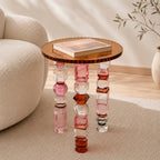 Jewelry-Inspired Acrylic Side Table Series With Amber Tones and Sculptural Legs