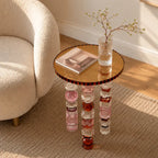 Jewelry-Inspired Acrylic Side Table Series With Amber Tones and Sculptural Legs