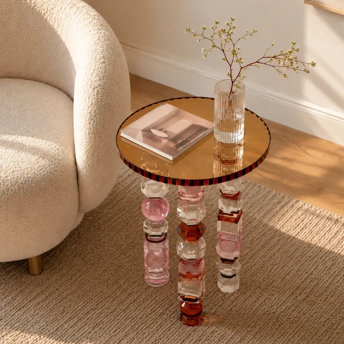 Jewelry-Inspired Acrylic Side Table Series With Amber Tones and Sculptural Legs