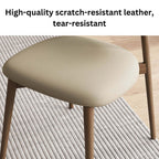 Minimalist khaki dining chair with scratch-resistant leather and solid wood frame