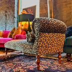 Leopard Print Chaise Lounge with Victorian Carved Wood and S-Curve Silhouette