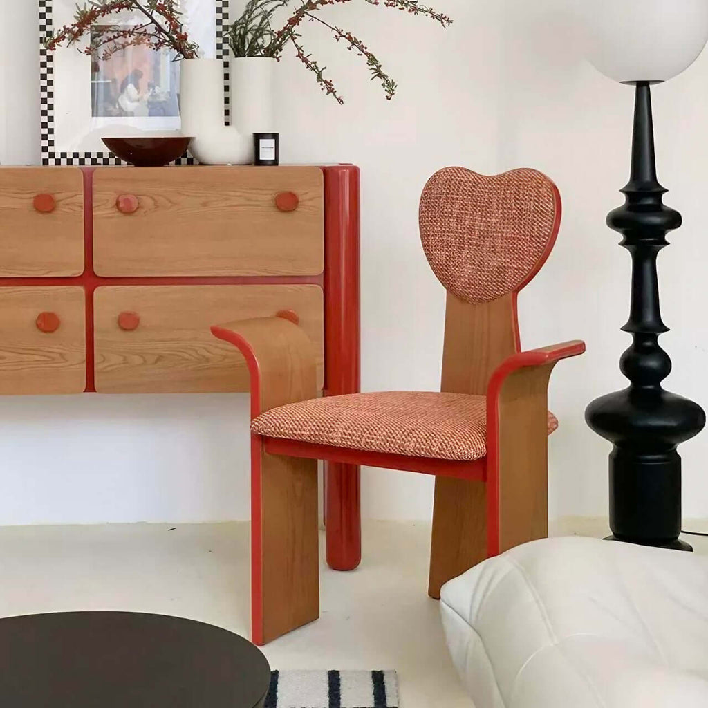 Light brown fabric dining chair with heart-shaped back and creative design