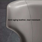 Light khaki saddle leather dining chair with C-shaped curved backrest, minimalist and luxurious design