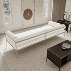 Low-Profile Stainless Steel Sofa with Minimalist Upholstery and Modular Cushions