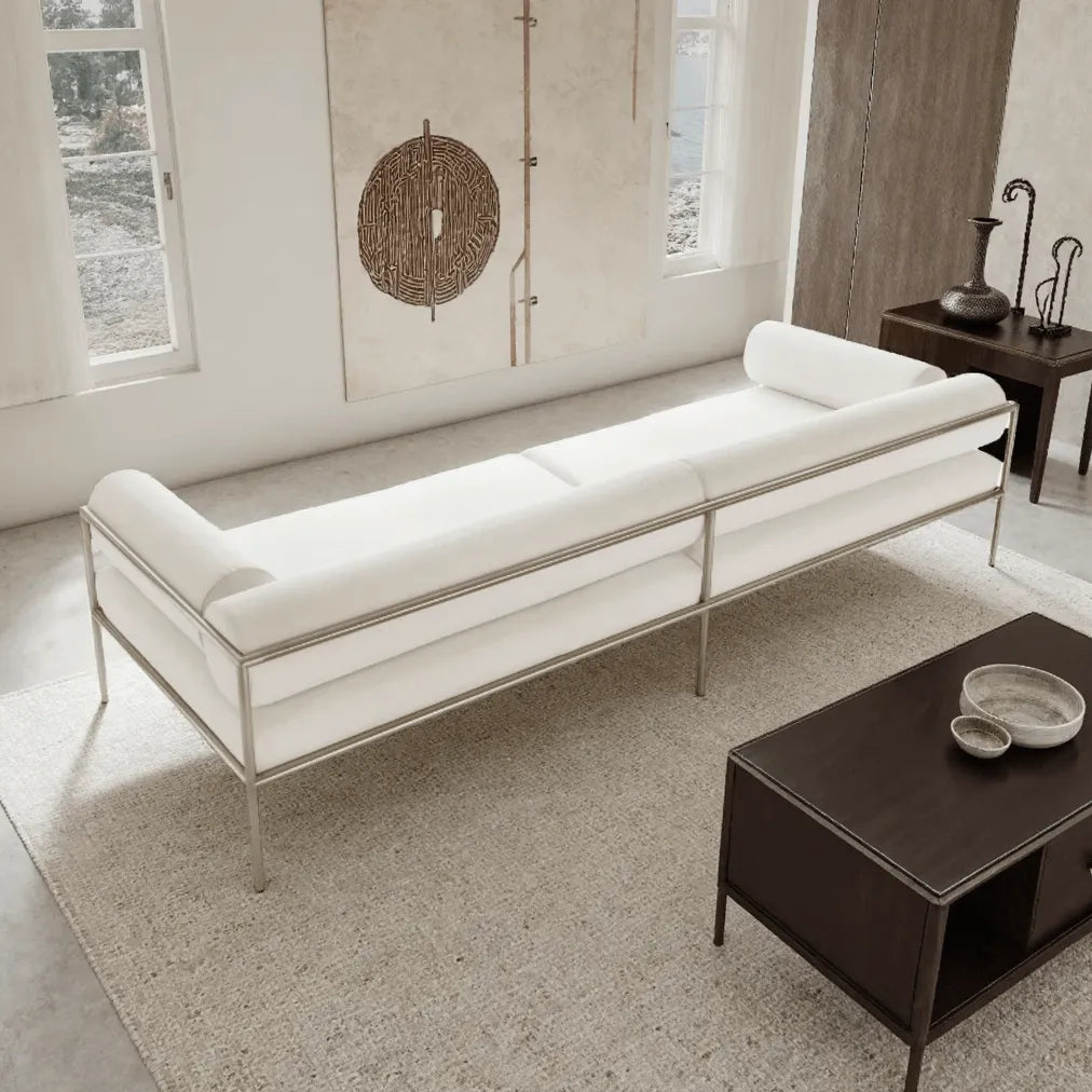 Low-Profile Stainless Steel Sofa with Minimalist Upholstery and Modular Cushions