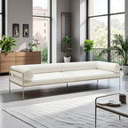 Low-Profile Stainless Steel Sofa with Minimalist Upholstery and Modular Cushions
