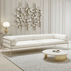 Low-Profile Stainless Steel Sofa with Minimalist Upholstery and Modular Cushions