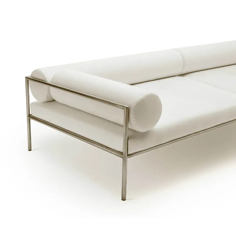 Low-Profile Stainless Steel Sofa with Minimalist Upholstery and Modular Cushions