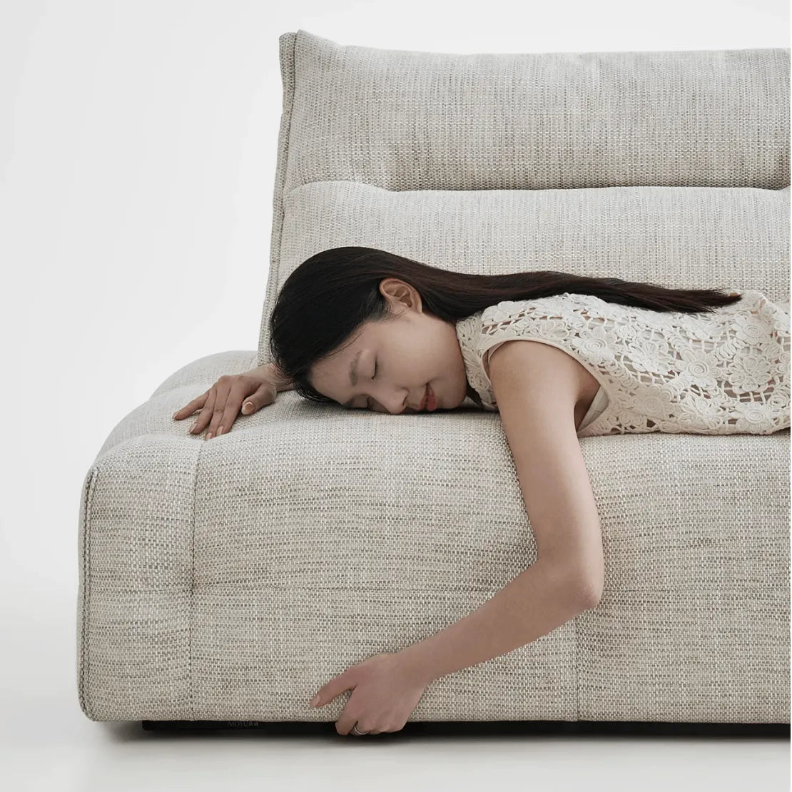 Low-Profile Textured Modular Sofa with Plush Curves for Lounge Living