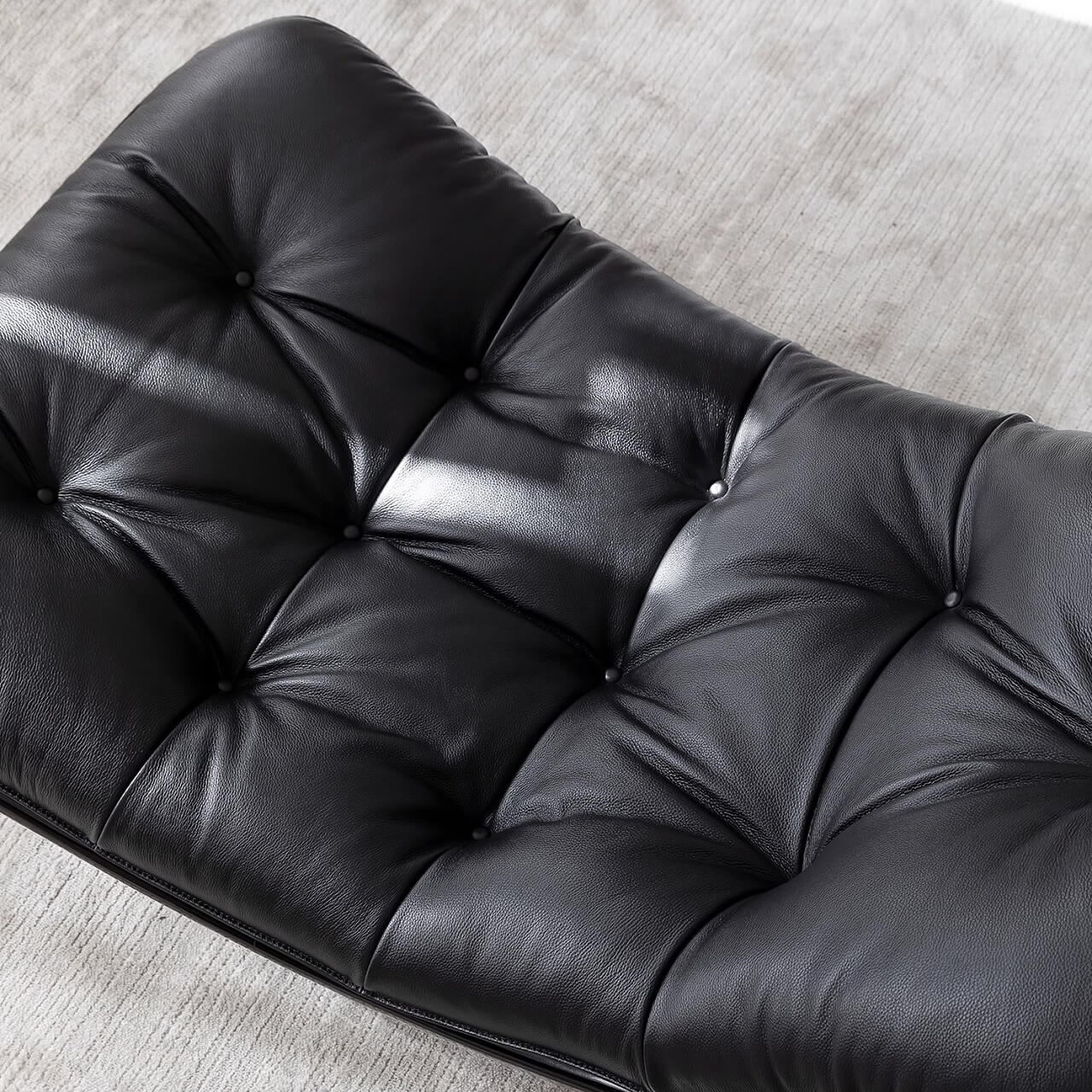 Black microfiber leather recliner chair with unique eggshell shape for luxurious comfort