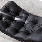 Black microfiber leather recliner chair with unique eggshell shape for luxurious comfort
