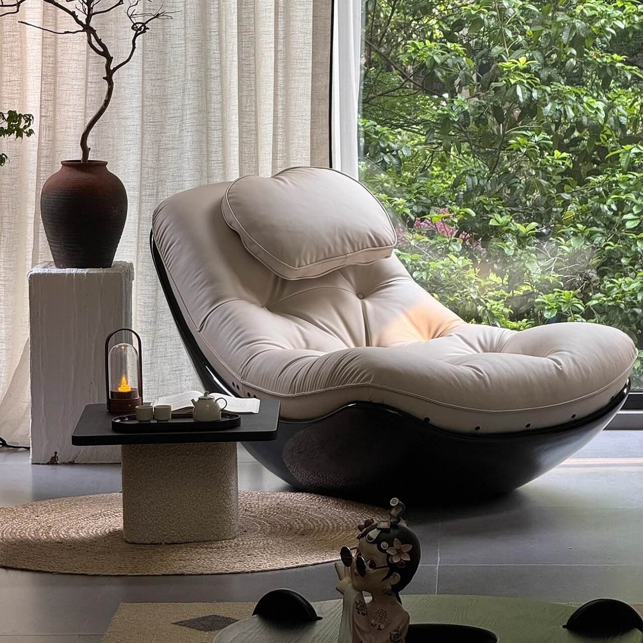 Black microfiber leather recliner chair with unique eggshell shape for luxurious comfort