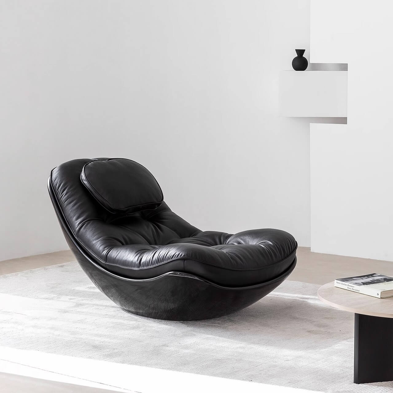 Black microfiber leather recliner chair with unique eggshell shape for luxurious comfort