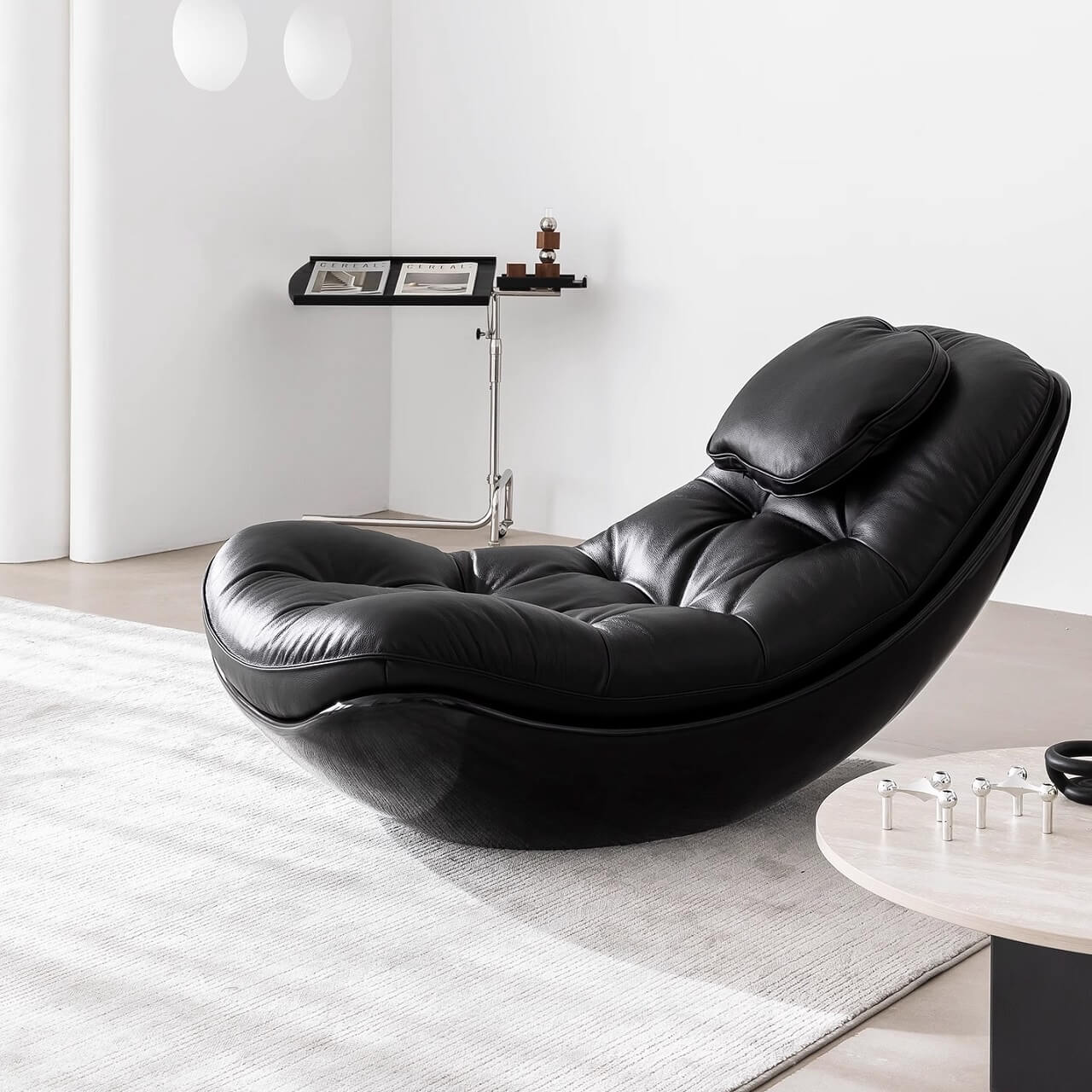 Black microfiber leather recliner chair with unique eggshell shape for luxurious comfort