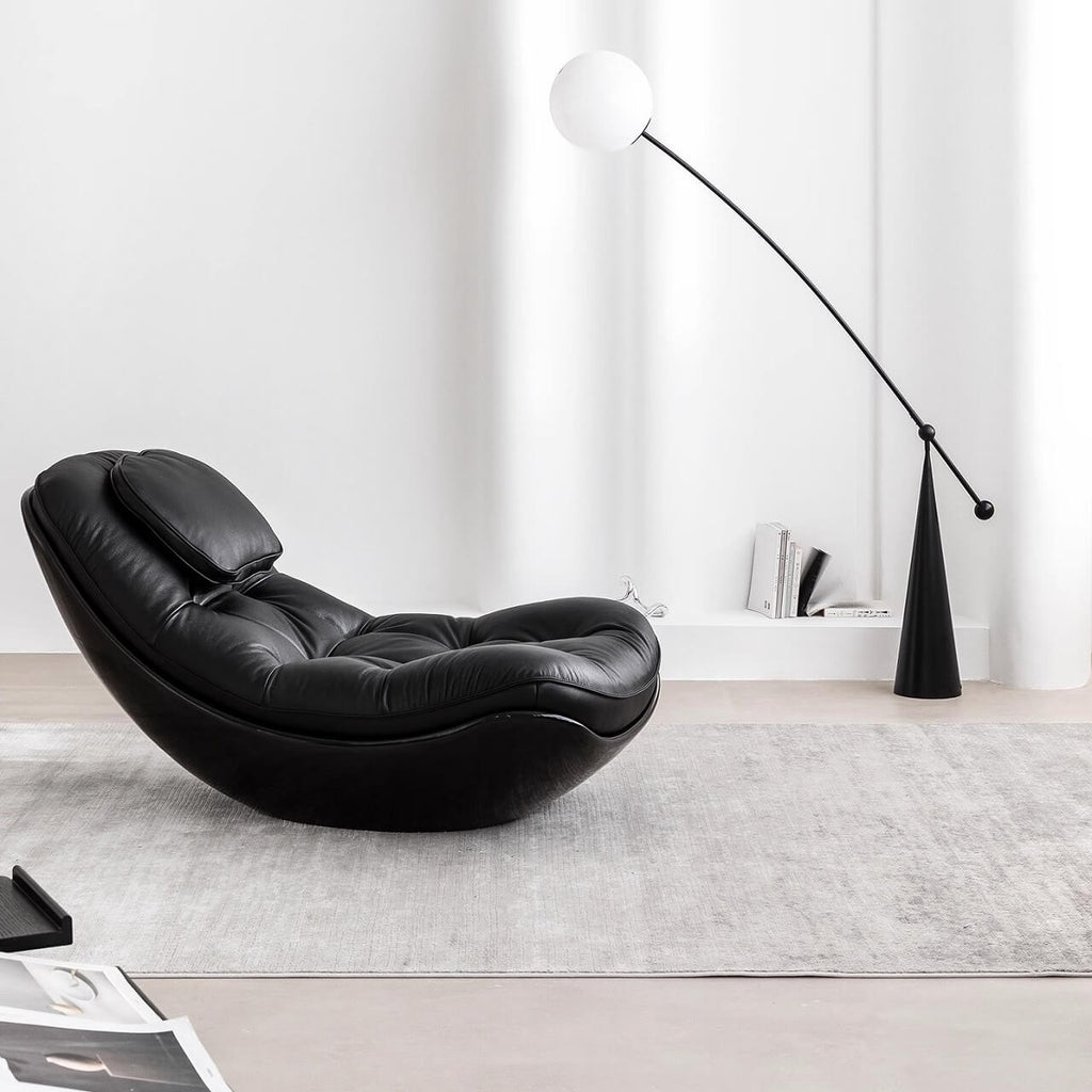 Black microfiber leather recliner chair with unique eggshell shape for luxurious comfort
