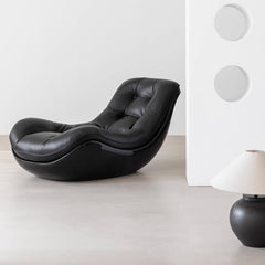 Eggshell shaped black leather recliner sofa