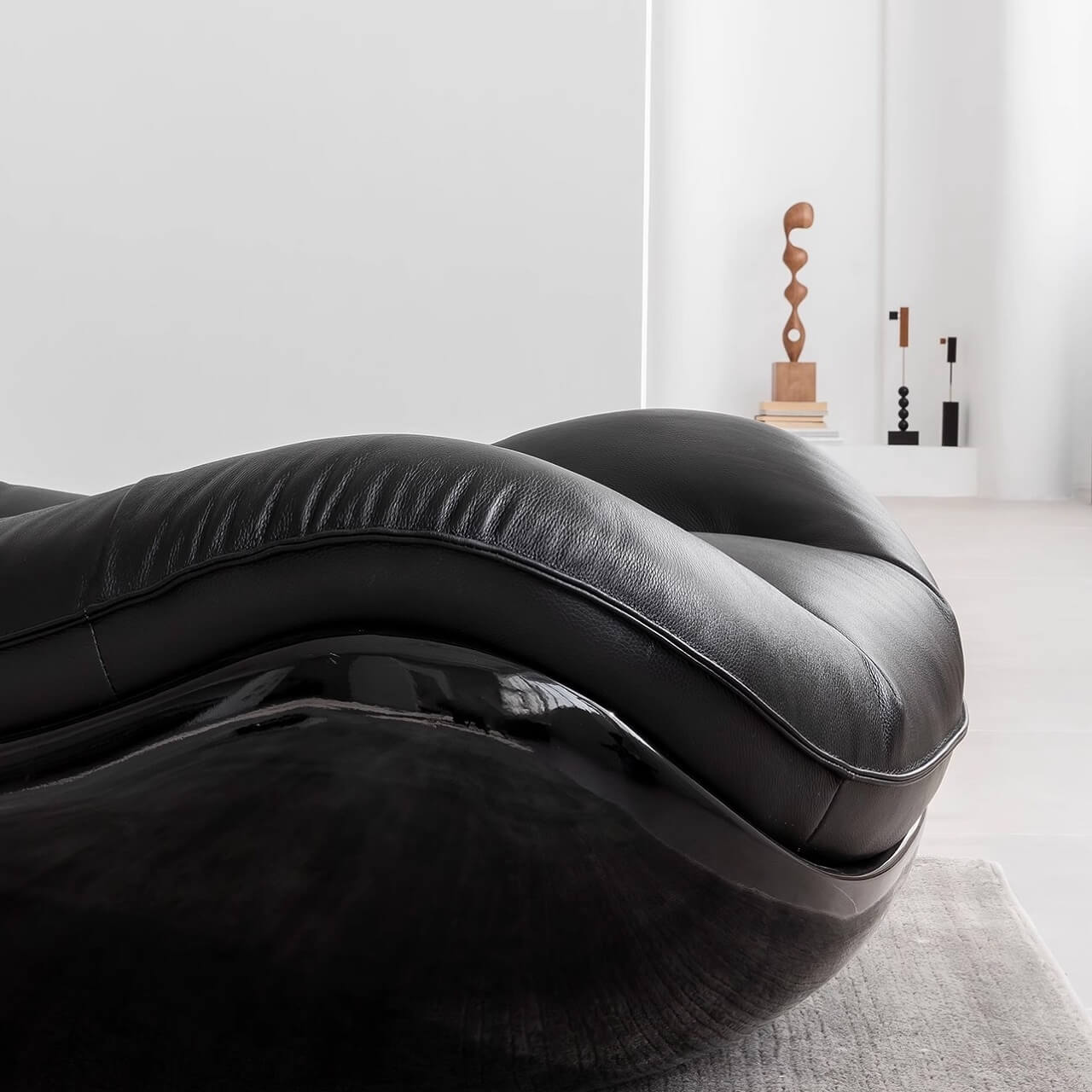 Black microfiber leather recliner sofa with unique eggshell shape for luxurious comfort