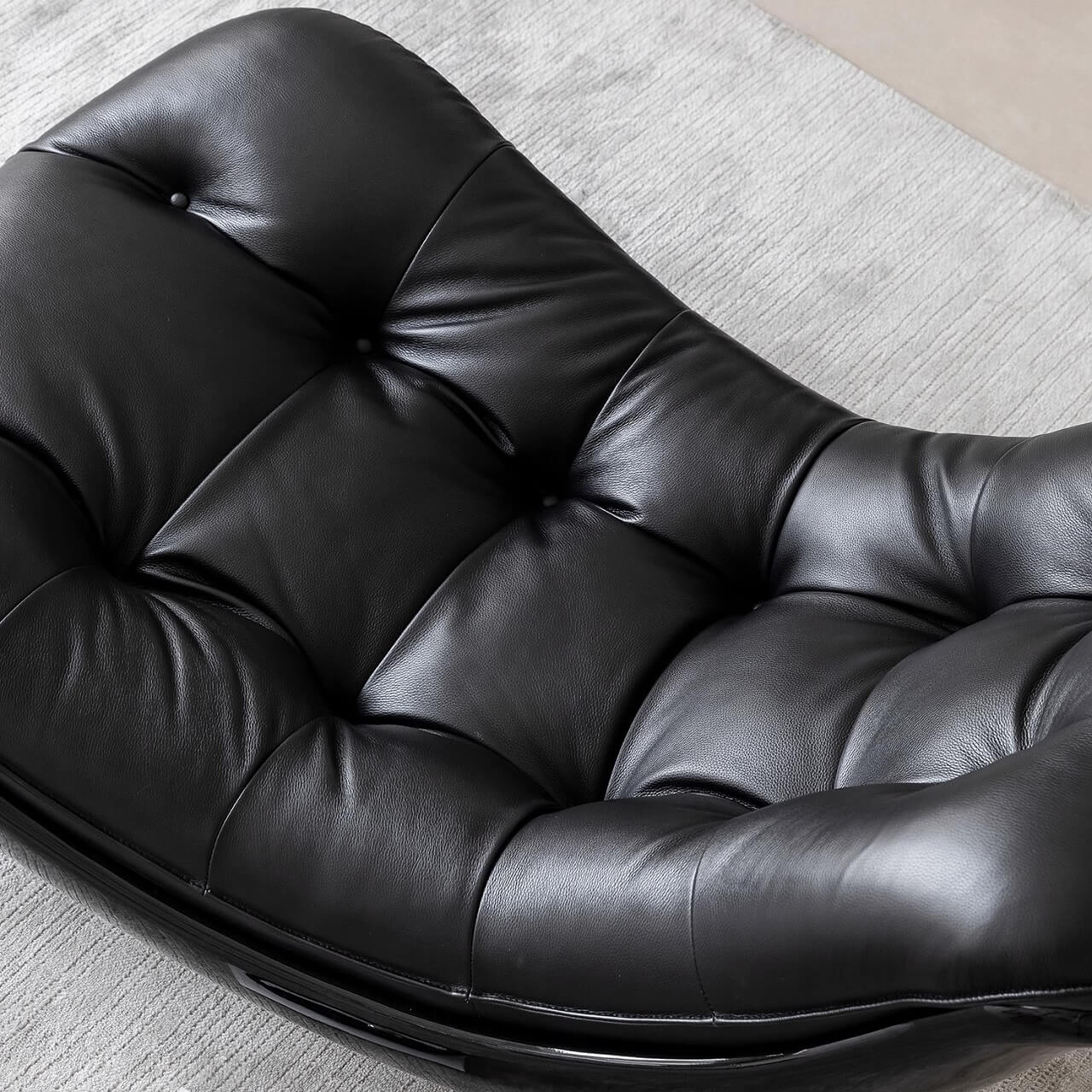 Black microfiber leather recliner sofa with unique eggshell shape for luxurious comfort