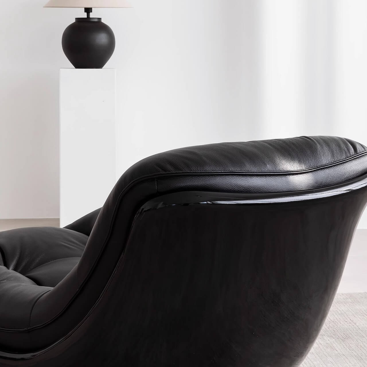 Black microfiber leather recliner sofa with unique eggshell shape for luxurious comfort