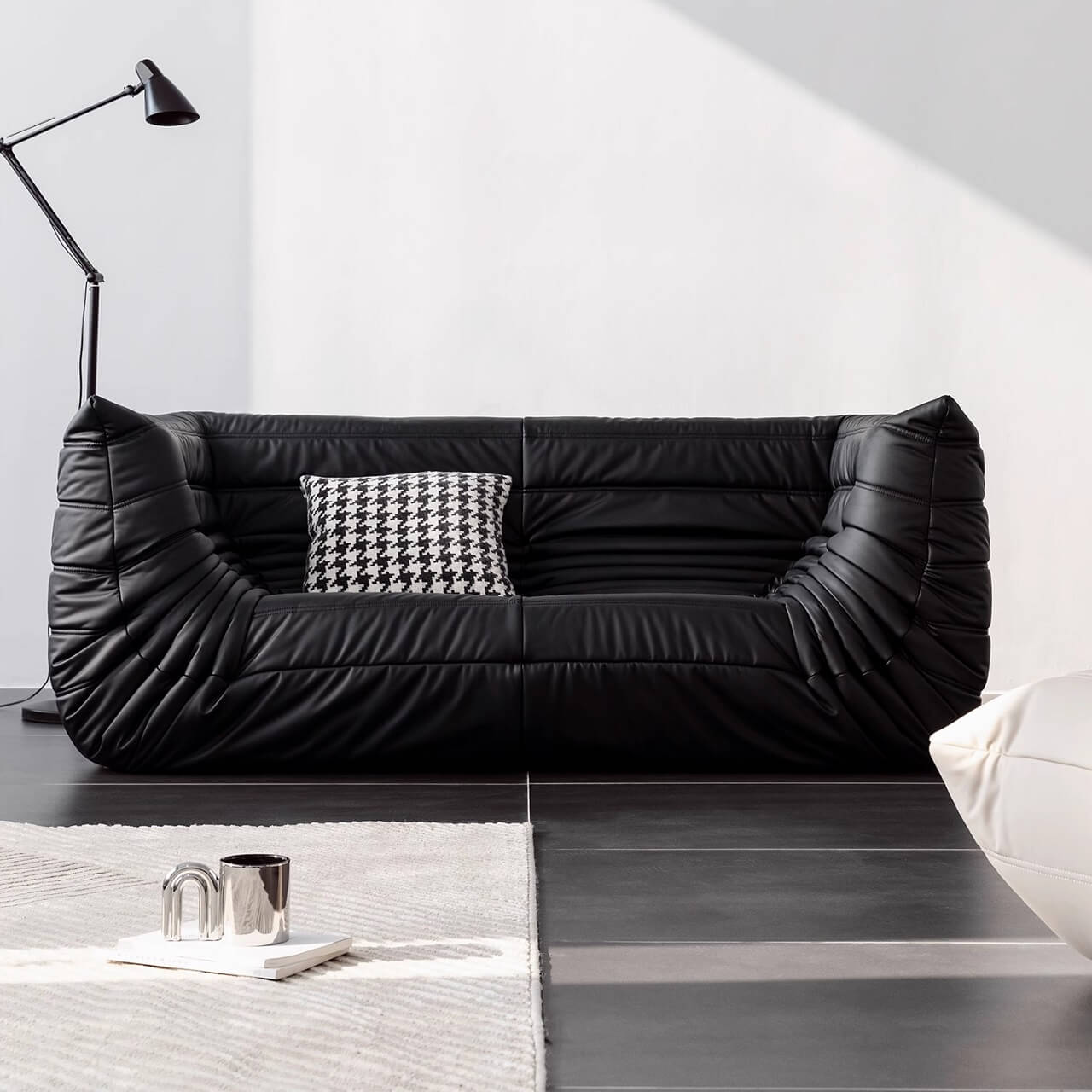 Black microfiber leather sofa in comfortable caterpillar style, measuring 70.87 inches long main product image メイン画像