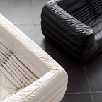 Black microfiber leather sofa in comfortable caterpillar style, measuring 70.87 inches long