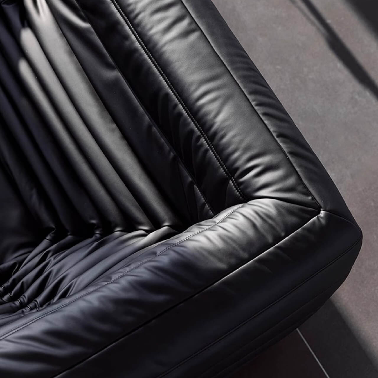 Black microfiber leather sofa in comfortable caterpillar style, measuring 70.87 inches long