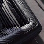 Black microfiber leather sofa in comfortable caterpillar style, measuring 70.87 inches long