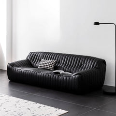 Elegant and comfortable black leather sofa for four