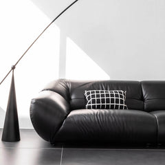 Stylish black microfiber leather couch in minimalist style