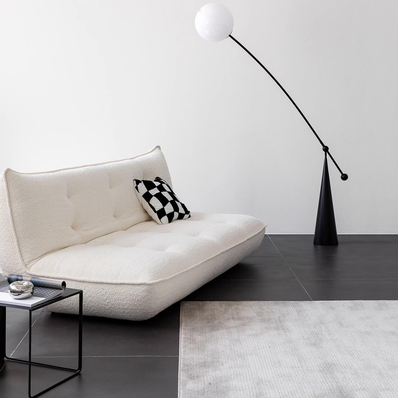 White boucle sofa bed combining comfort, style, and versatility for modern living spaces