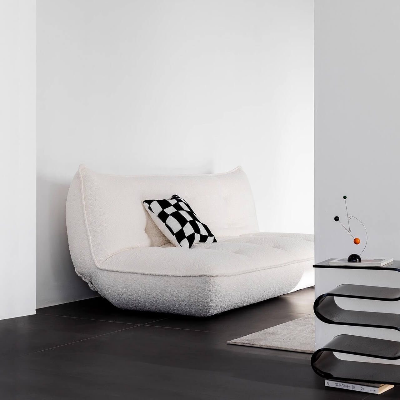 White boucle sofa bed combining comfort, style, and versatility for modern living spaces