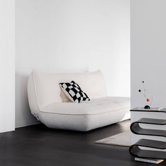 Elegant white boucle sofa bed with versatile design