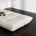 White boucle sofa bed combining comfort, style, and versatility for modern living spaces