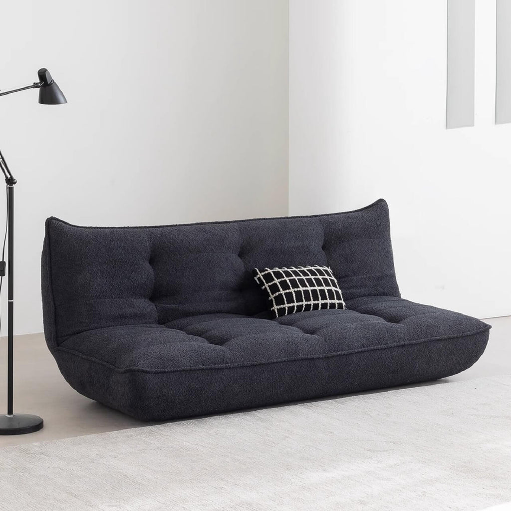 White boucle sofa bed combining comfort, style, and versatility for modern living spaces