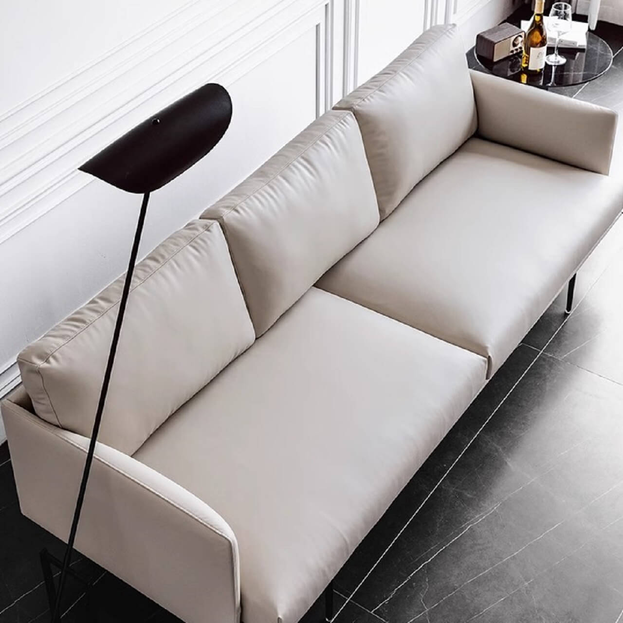 White microfiber leather sofa with minimalist design, measuring 87.8 inches long