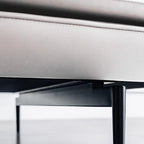 White microfiber leather sofa with minimalist design, measuring 87.8 inches long