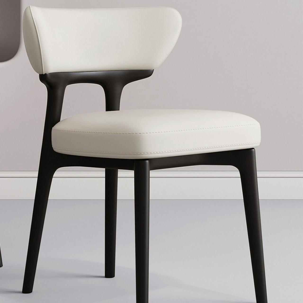 Elegant white modern minimalist dining chair with streamlined back