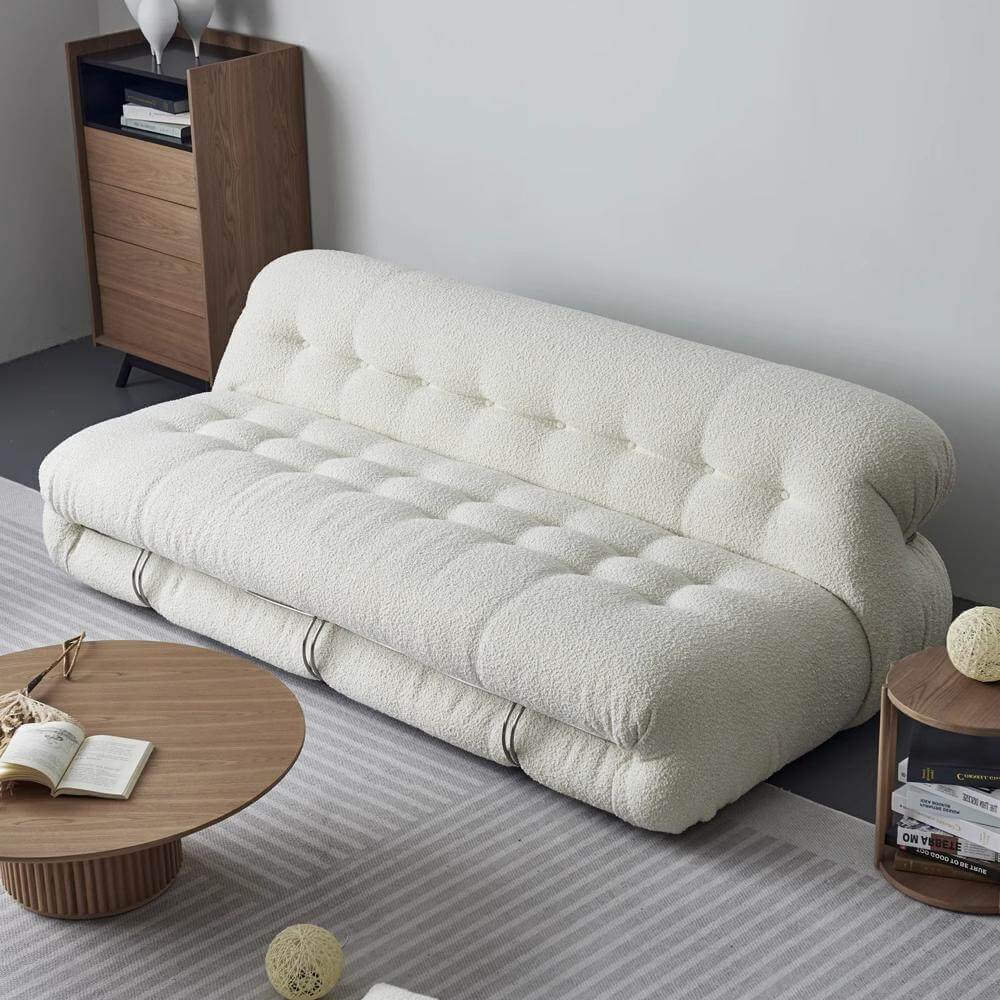 Mid-Century Soriana Lounge Sofa with bouclé upholstery and stainless steel accents