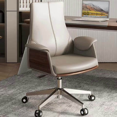 Contemporary ergonomic gray leather office chair with flared arms and silver metal legs for comfortable seating