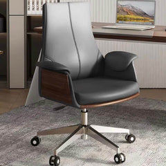 Sleek gray leather arc-shaped desk chair with flared arms and silver metal legs for stylish office decor