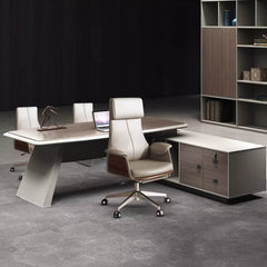 Fashionable gray leather desk chair with flared arms and silver metal legs for trendy and upscale office interiors