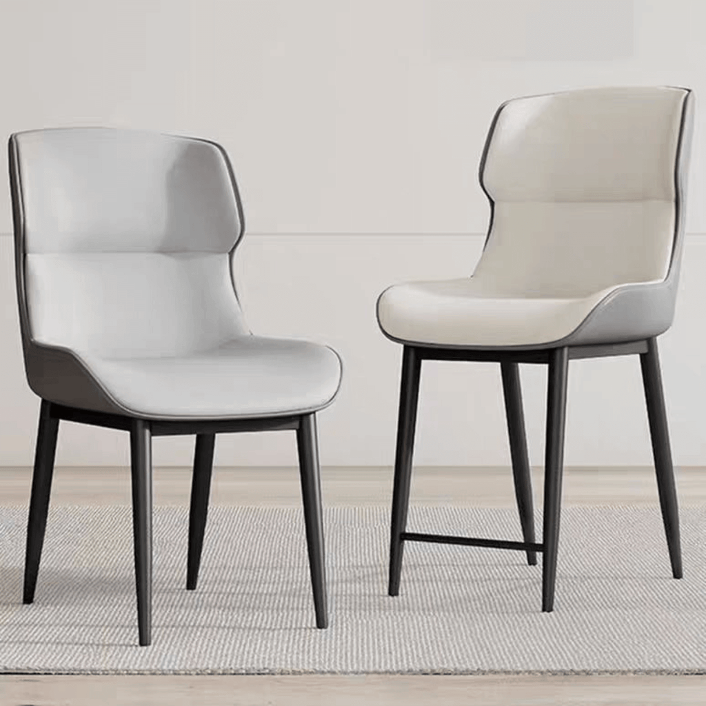 Light grey high-back dining chair with durable leather, minimalist luxury design