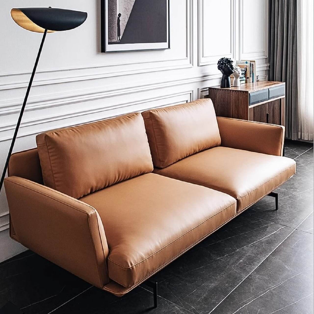 Orange microfiber leather sofa with minimalist design, sleek style, and 88.58-inch length for comfortable seating