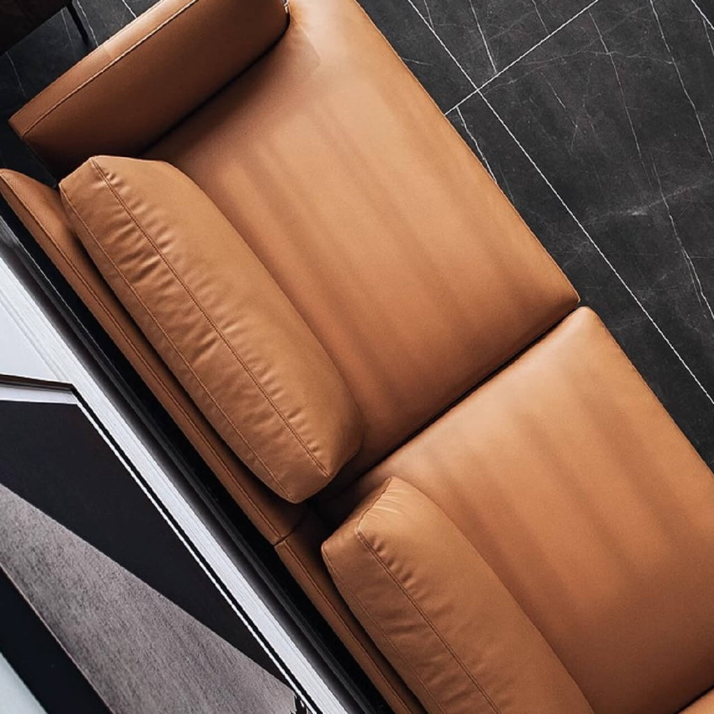 Orange microfiber leather sofa with minimalist design, sleek style, and 88.58-inch length for comfortable seating