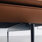 Orange microfiber leather sofa with minimalist design, sleek style, and 88.58-inch length for comfortable seating